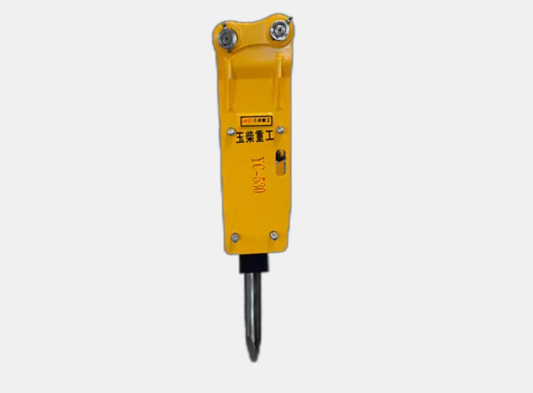 Yellow hydraulic breaker attachment.